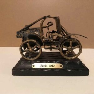 Vintage Ford 1910 metal art piece